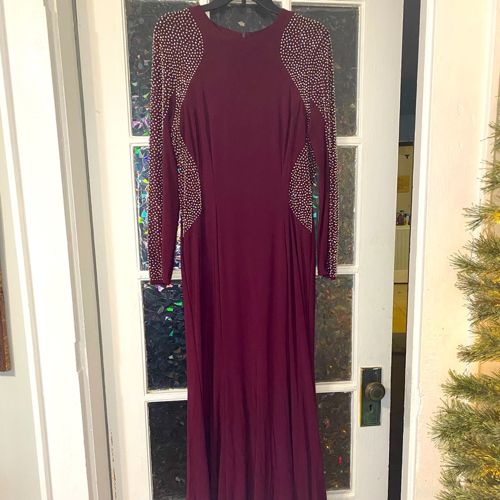 Form fitting gown with beading on sleeves and waist Size 16, only worn once
